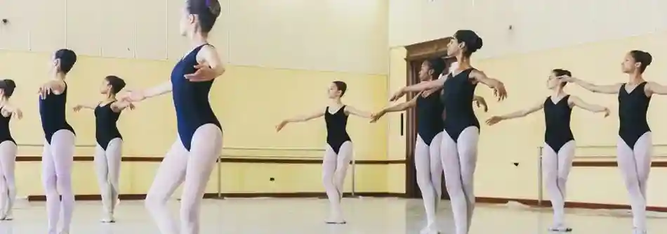 Ballet dancers in middle of the studio