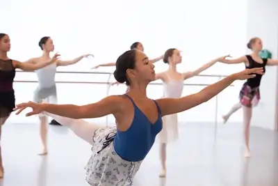 Ballet dancers rehearsing in class