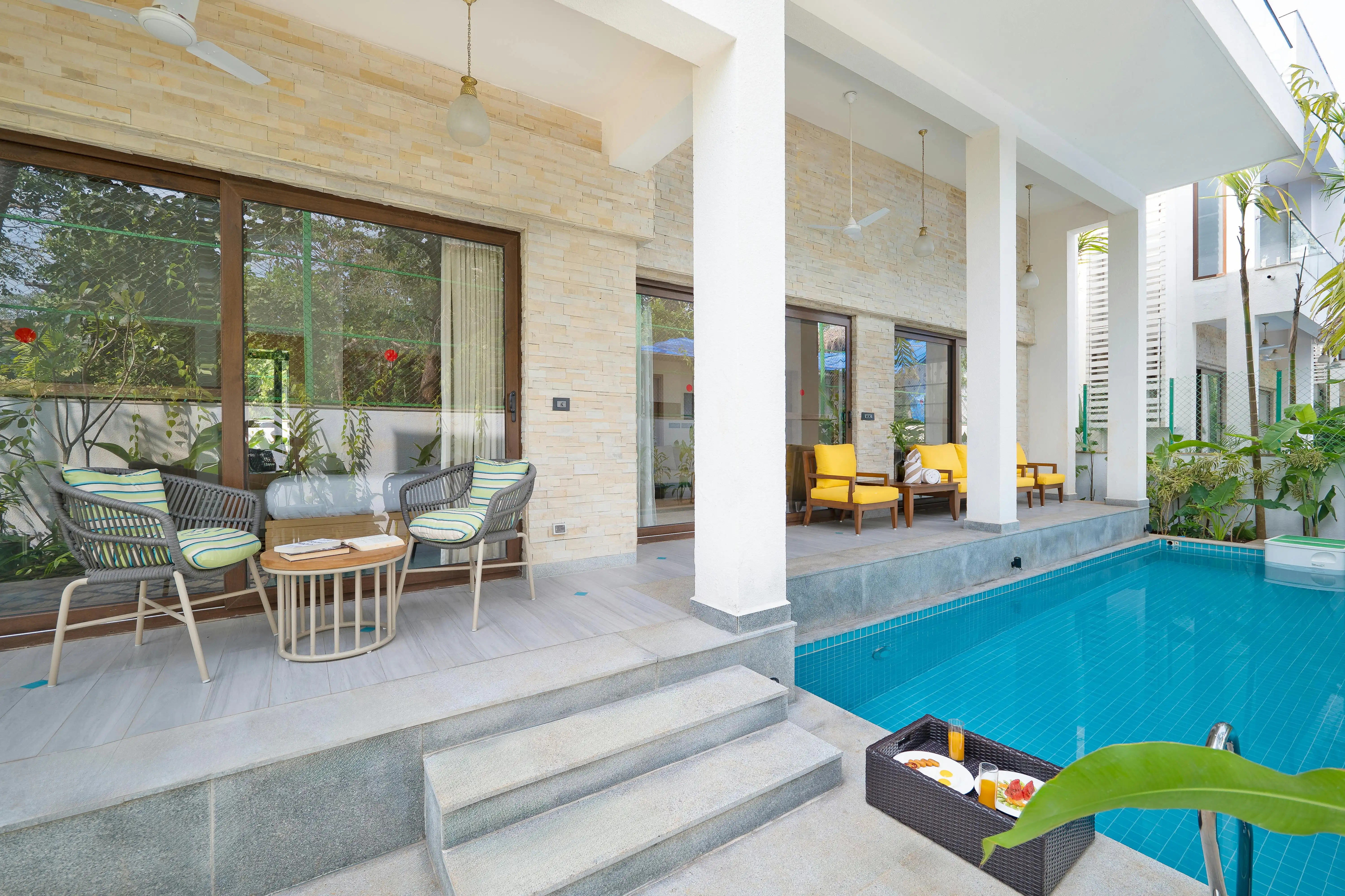 Indoor pool with seating area
