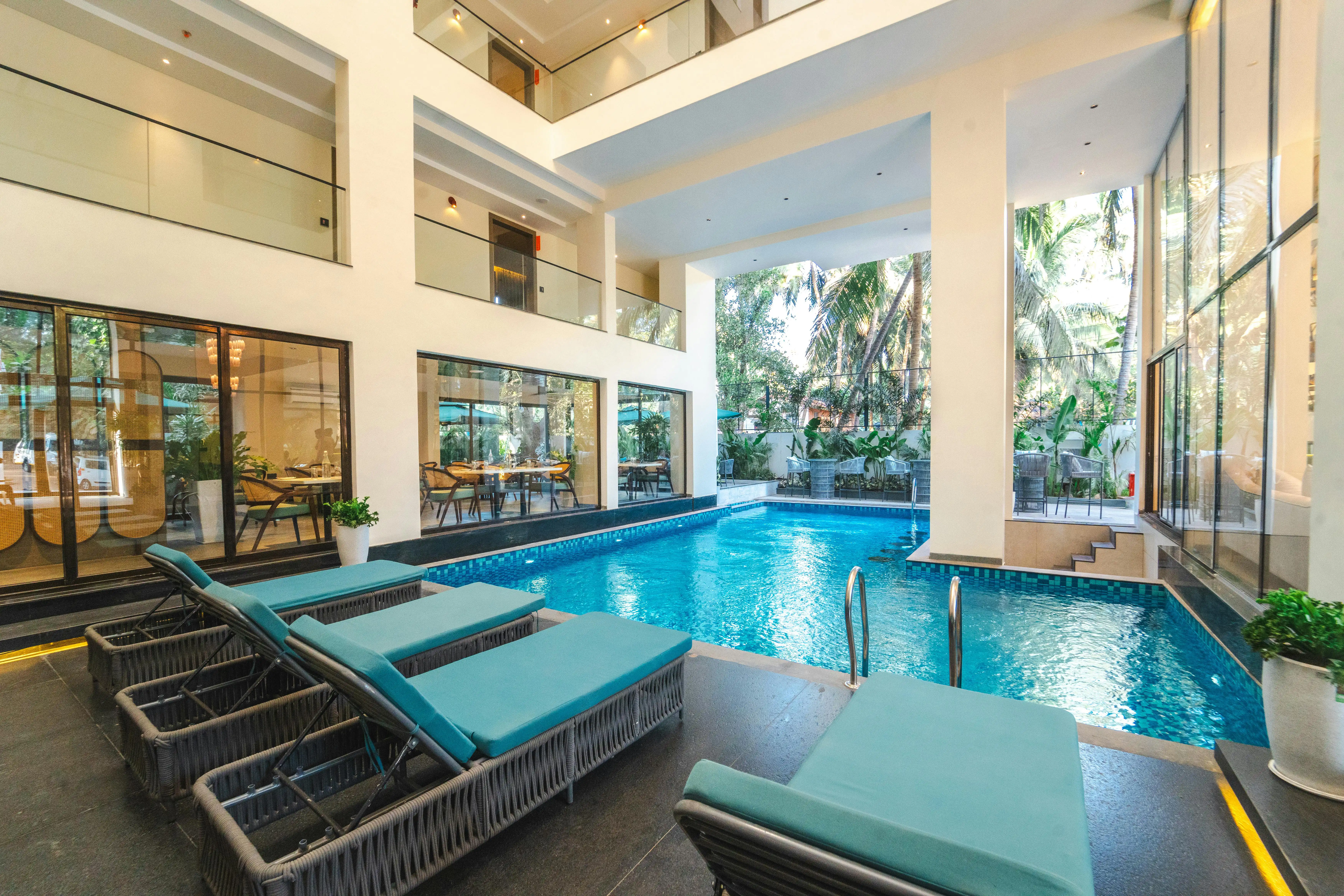 Indoor swimming pool with loungers